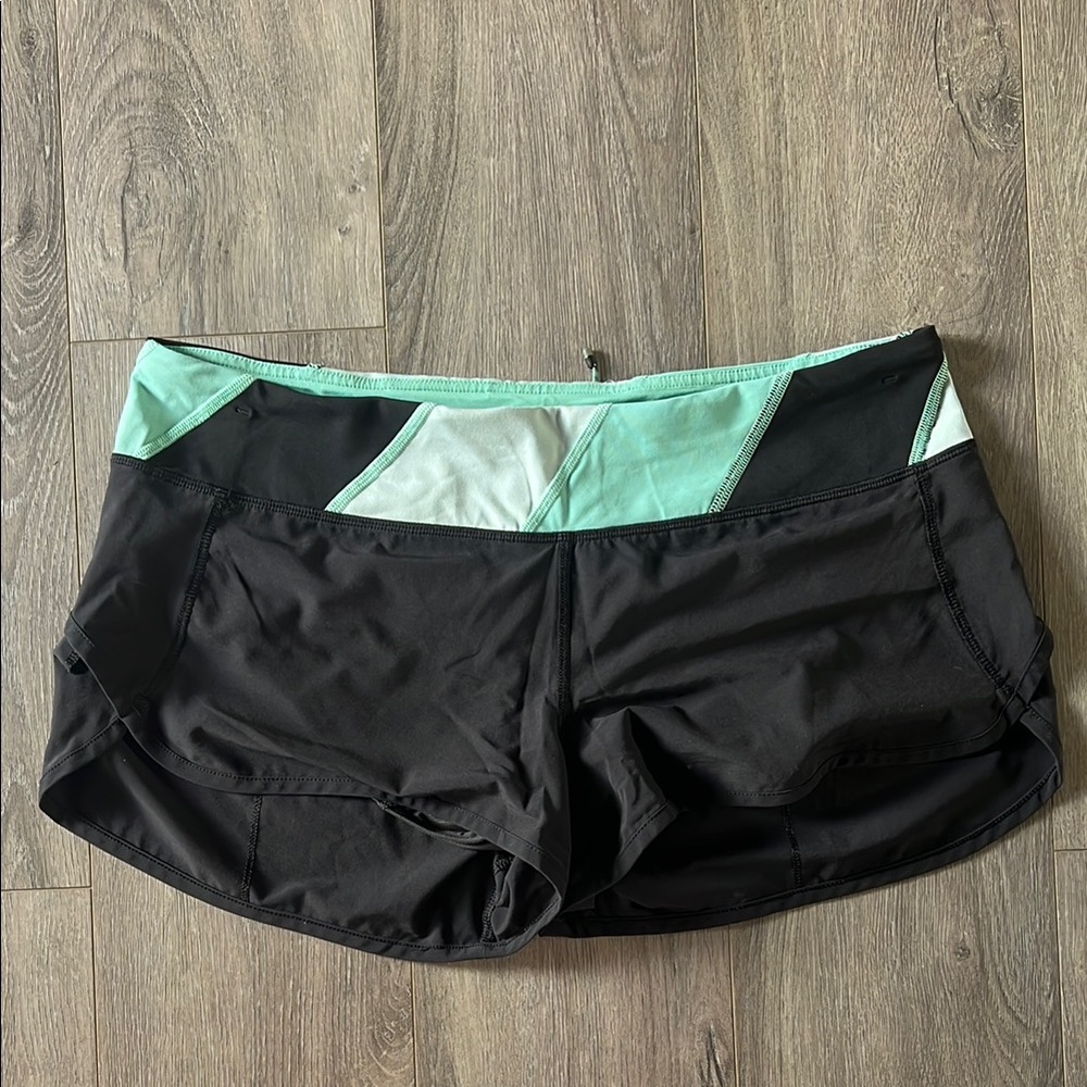 Lululemon Athletica Black and Green speed Shorts - size 10